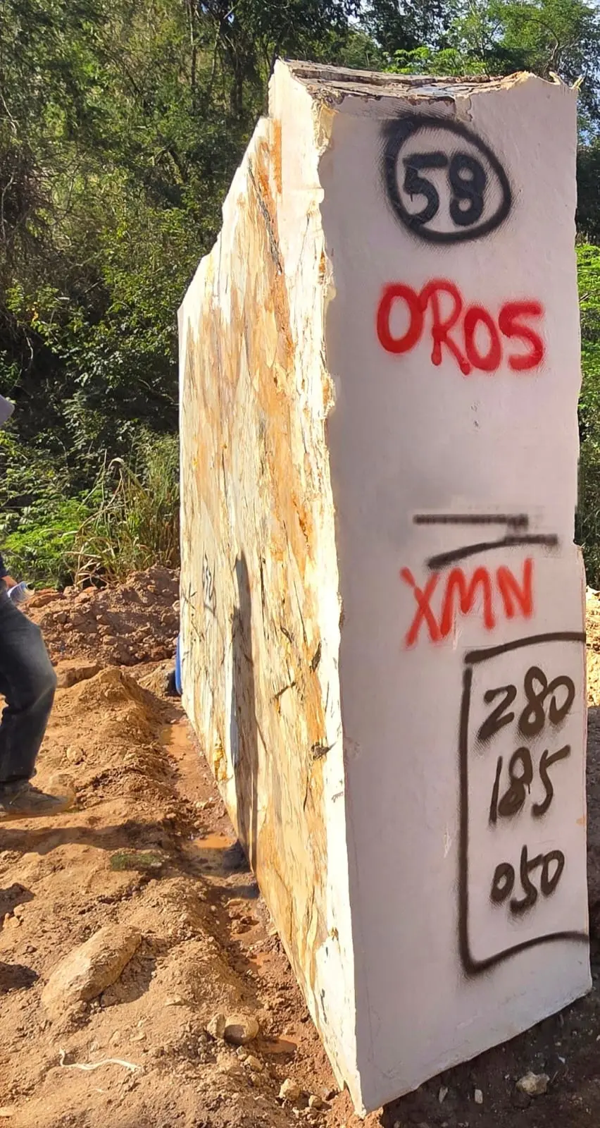 OROS branded stone block in quarry