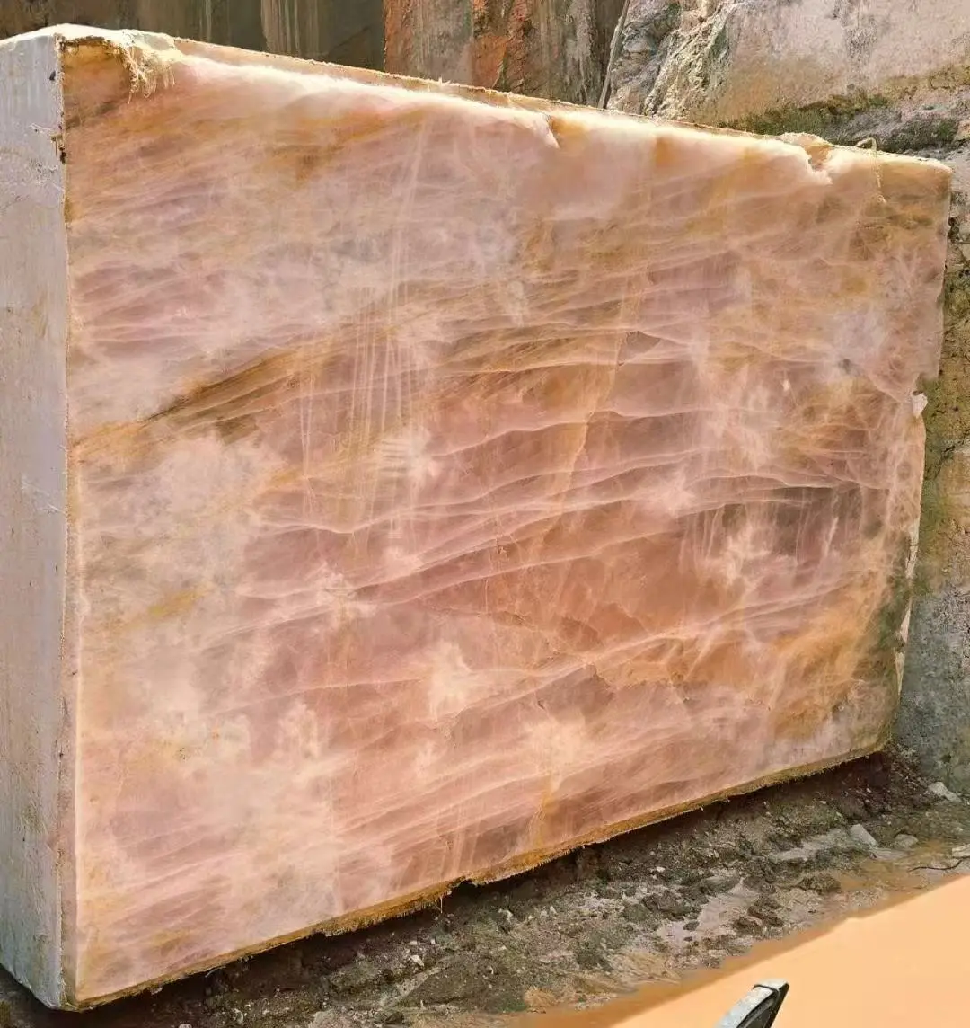 Pink quartzite block with crystalline structure